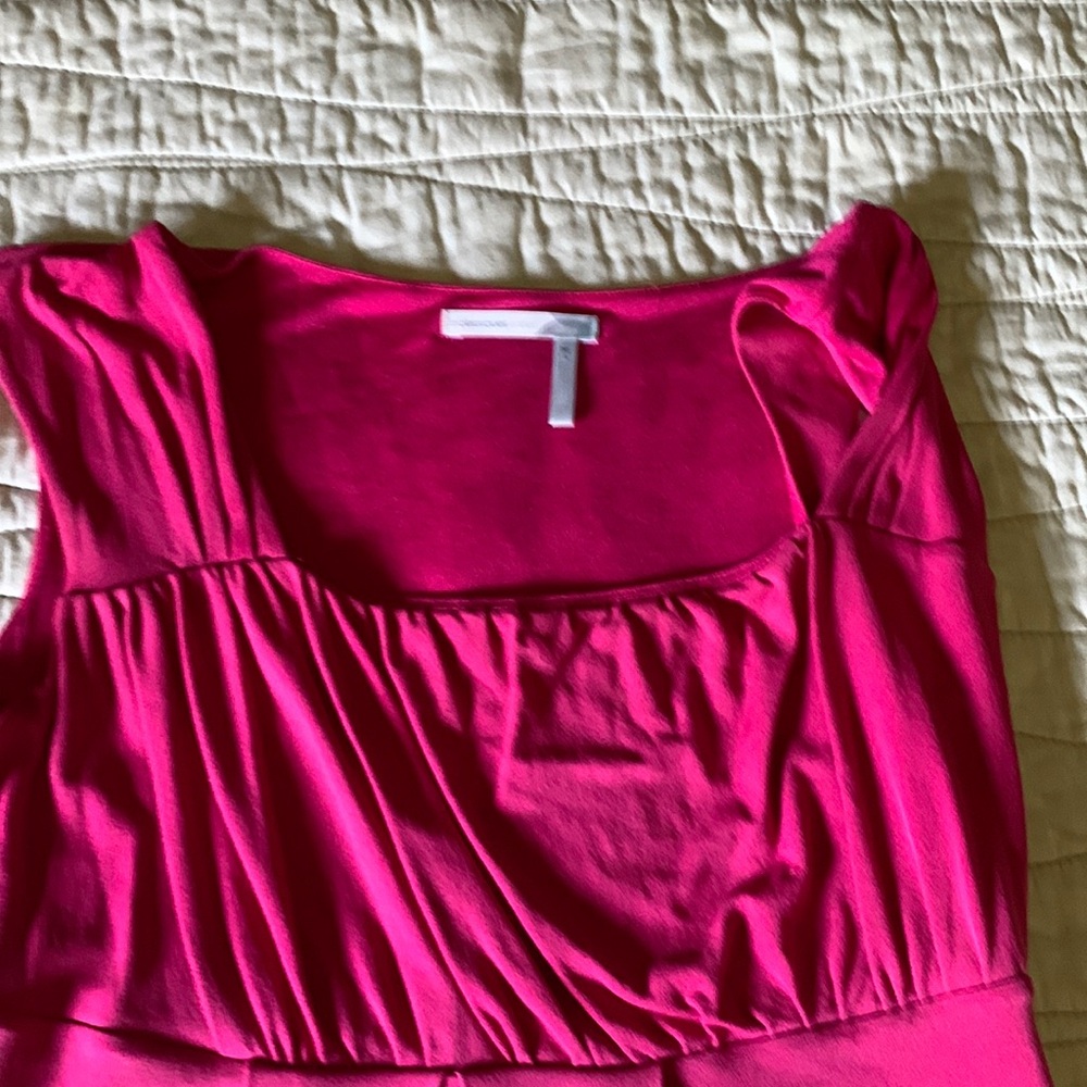 Pink sleeveless wide neck shirt